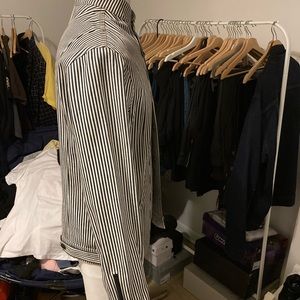 Pyer Moss vertical striped navy and white denim jacket with the Mandarin collar